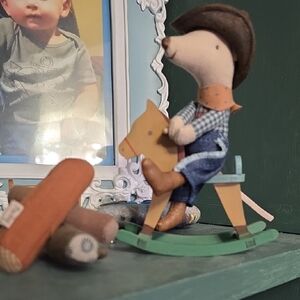 Handcrafted Green Wooden Rocking Horse Toy with Plush Rider